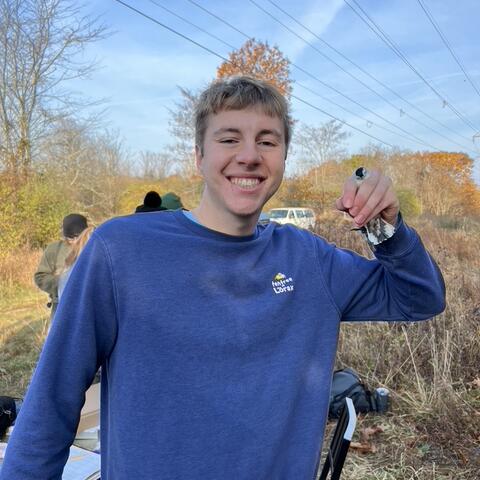 TJ holding a WBNU